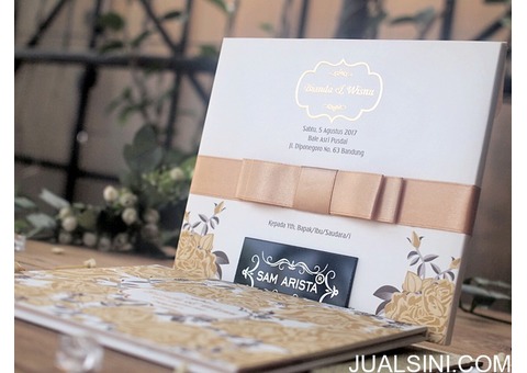 Wedding invitation card with gold and broken white